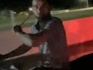 The weapon used was identified as a metal rod in a video circulating on social media