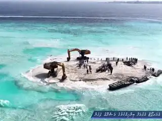 Footage from the event held to launch the land reclamation project for the development of an airport on N. Vihafaru shows sediment and sludge spreading across the entire surrounding area.