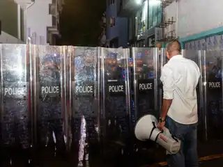 Protesters gathered on Wednesday night to demand the release of imprisoned journalists.