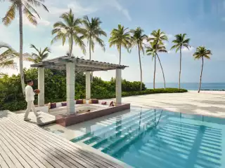 A private haven at Jumeirah Olhahali Island, where ocean views, swaying palms, and pure luxury meet.