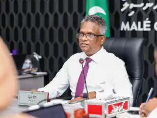 Mayor Adam Azim delivers remarks at the 8th official general meeting of the Malé City Council's 5th term.