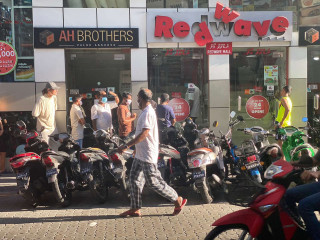 People queued up outside a local shop