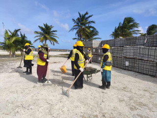 Female employees of the Road Development Corporation (RDC) working on the road development project in Sh. Milandhoo.
