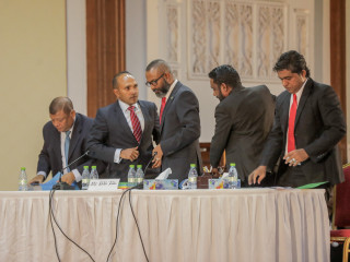 Justice Abdulla Didi and defence team