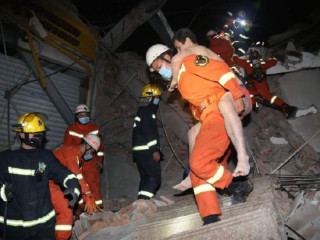 ޗައިނާގައި ގިނަ ބަޔަކު ކަރަންޓީންކޮށްފައި ހުރި އިމާރާތެއް ވެއްޓި ގިނަ ބަޔަކު ތާށިވެއްޖެ