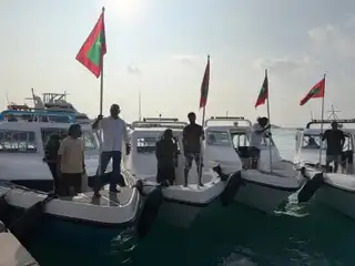 Protesters take to the sea, raising their concerns regarding the extraction of sand for the Ras Malé land reclamation project