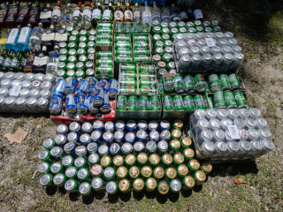 The bottles of alcohol and cans of beer destroyed by police