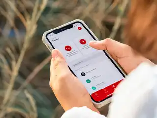 A woman uses BML's online banking service.