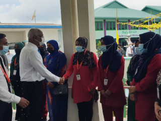 President Solih with the staff at Lh. Naifaru Madharusathul Ifthithaah during the inauguration ceremony of 10 new classrooms
