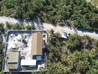 GDh. Nadella is an island characterized by its abundant coconut palms. | Social Media