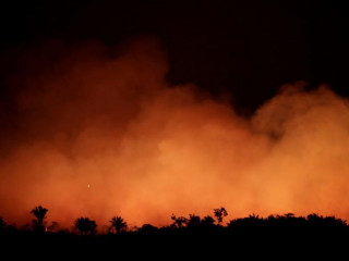 Smoke billows during a fire in an area of the Amazon rainforest near Humaita in Brazil\'s Amazonas state