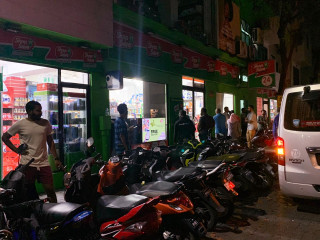 People gathered outside a shop in the capital despite the city-wide lockdown announced since Wednesday