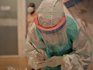 Healthcare workers collecting samples for Covid-19 testing