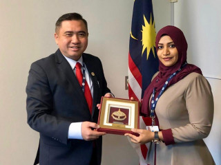Transport Minister Aishath Nahula with her Malaysia counterpart, Anthony Loke Siew Fook