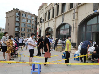 ޗައިނާގައި ކޮވިޑް-19 އަށް ޓެސްޓް ކުރުމަށް މީހުން ކިޔުގައި މަޑުކޮށްލައިގެން