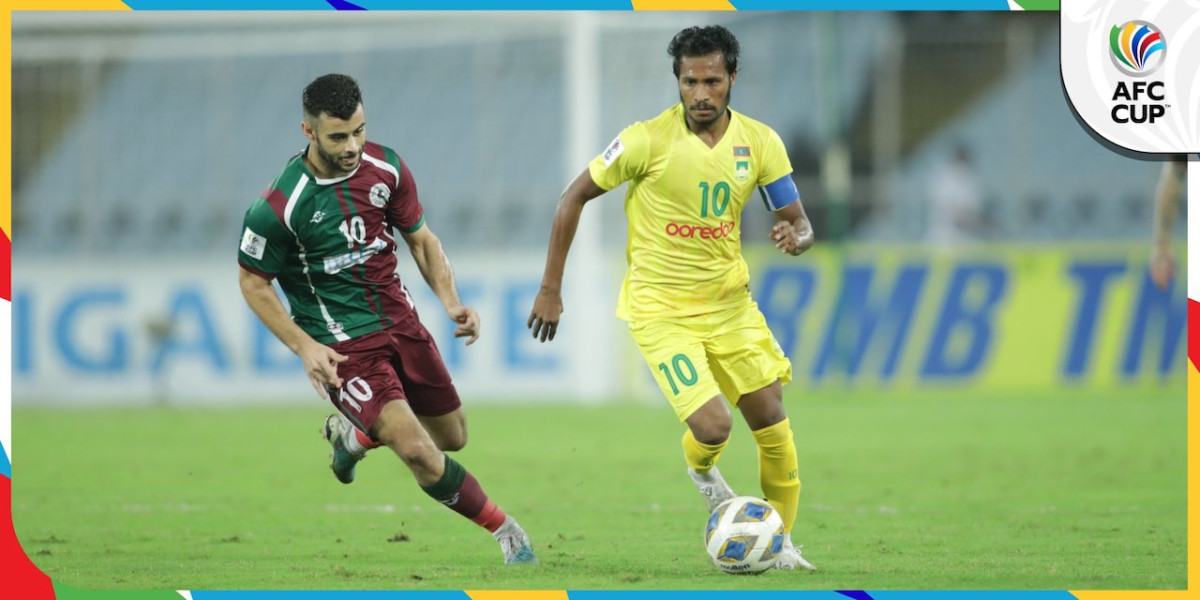 މޯހަން ބަގާން ކުޅުންތެރިން އަތުން ބޯޅަ ހިފައިގެން ހަމްޕު ދަނީ: ފޮޓޯ-އޭއެފްސީ