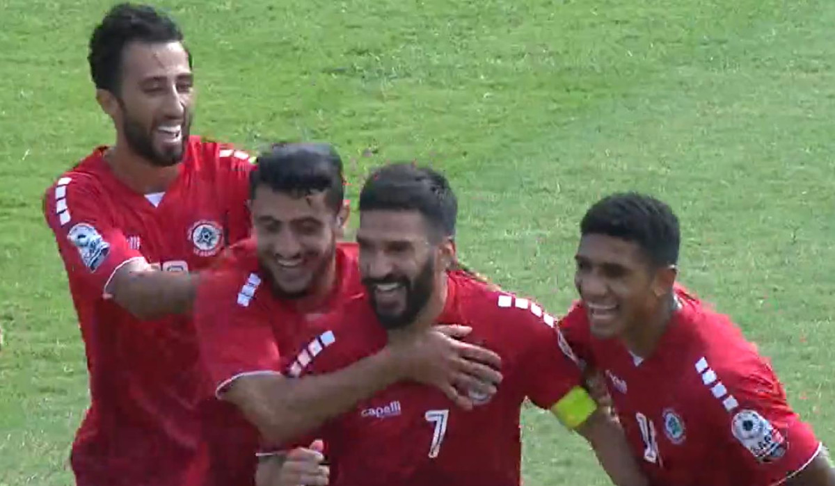 Lebanon players celebrate after scoring a goal against Maldives
