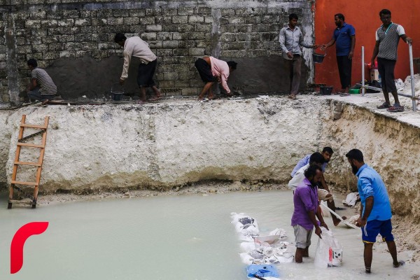 .Sea water accumulated in a construction are. We need to acknowledge our vulnerability to climate change.