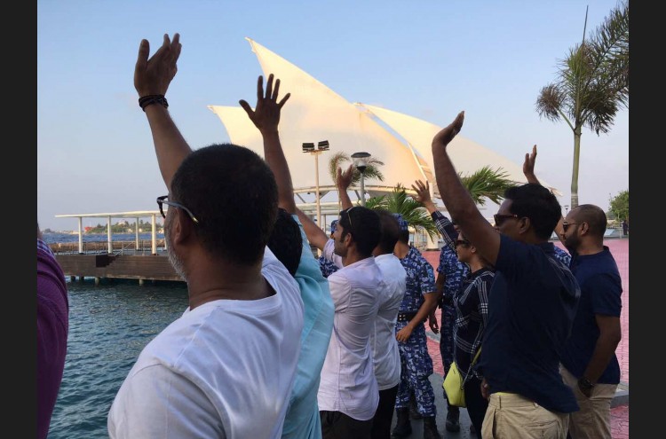 Qasim’s family members near jetty as he was taken back to Dhoonidhoo Detention Center, after being issued a six-day remand