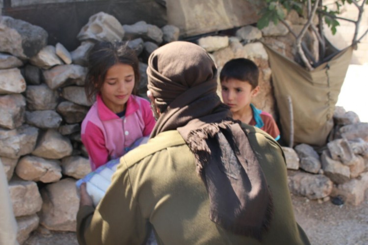 The combatants had visited refugee camps and rural villages in order to distribute food