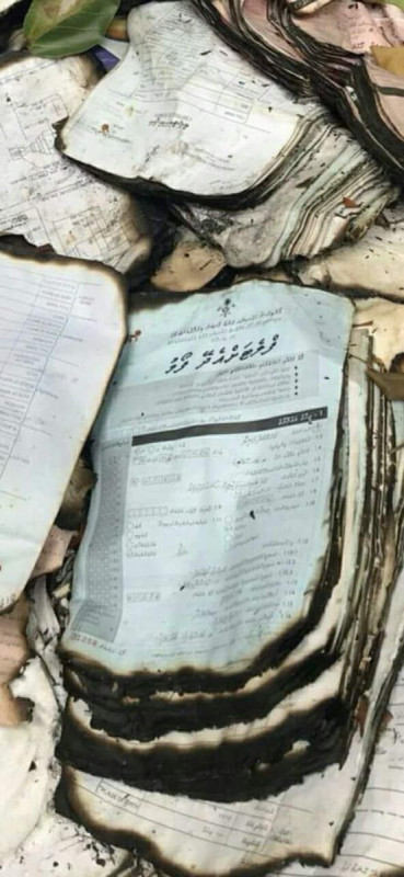 Photographs of the incident show burnt applications for a state shelter program