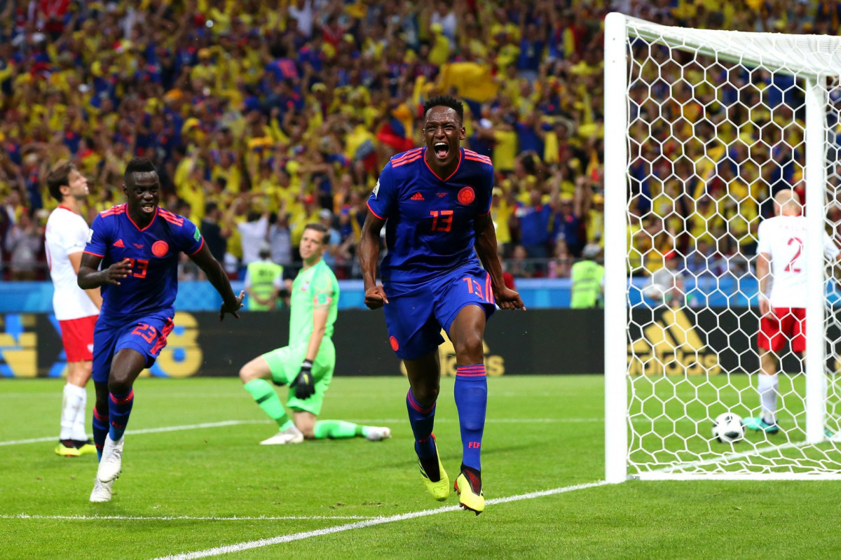 ގްރޫޕް އެޗްގައި ކޮލޮމްބިއާ އަދި ޕޮލެންޑް ކުޅުނު މެޗުގެ ތެރެއިން ކޮލޮމްބިއާގެ ފުރަތަމަ ލަނޑު ޖެހި ޔެރީ މިނާ ލަނޑު ޖެހުމަށްފަހު އުފާފާޅުކުރަނީއެވެ. މި މެޗު 3-0 ގެ ނަތީޖާއަކުން ކާމިޔާބުކުރީ ކޮލޮމްބިއާއެވެ. މިއީ މި ދެ ޓީމުގެ މެދުގައި ބައިނަލްއަގްވާމީ މުބާރާތެއްގައި ކުޅެވުނު ފުރަތަމަ މެޗަށްވާއިރު ވާރލްޑް ކަޕްގައި ޔޫރަޕުގެ ޓީމުތަކާއި ދެކޮޅަށް ކުޅުނު ނުވަ މެޗުގެ ތެރެއިން ކޮލޮމްބިއާ މޮޅުވެފައި އޮތީ އެންމެ ދެ މެޗުންނެވެ.