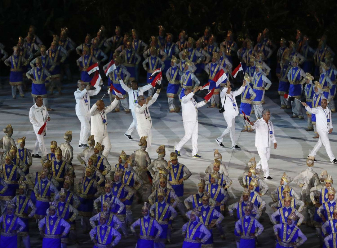 އޯގަސްޓް 18، 2018: އިންޑޮނީޝިއާ- އޯގަސްޓް 18 އިން ސެޕްޓެމްބަރު 2 އަށް އިންޑޮނީޝިއާގެ ޖަކާޓާ އަދި ޕެލެމްބަންގްގައި ކުރިއަށްދާ އޭޝިއަން ގޭމްސްގެ ހުޅުވުމުގެ ރަސްމިއްޔާތުގައި ސީރިއާގެ ޓީމް ބައިވެރިވަނީ، މި އަހަރުގެ އޭޝިއަން ގޭމްސްގައި 45 ގައުމުން 40 ތަފާތު ކުޅިވަރެއްގައި ބައިވެރިވާނެއެވެ.