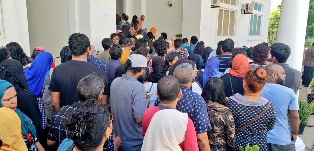Maldivian citizens in line to vote in previous elections conducted across the island nation