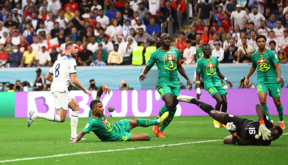 އިންގްލެންޑް އަދި ސެނެގާލް ކުޅުނު މެޗުގެ ތެރެއިން - ފޮޓޯ: ރޮއިޓާސް