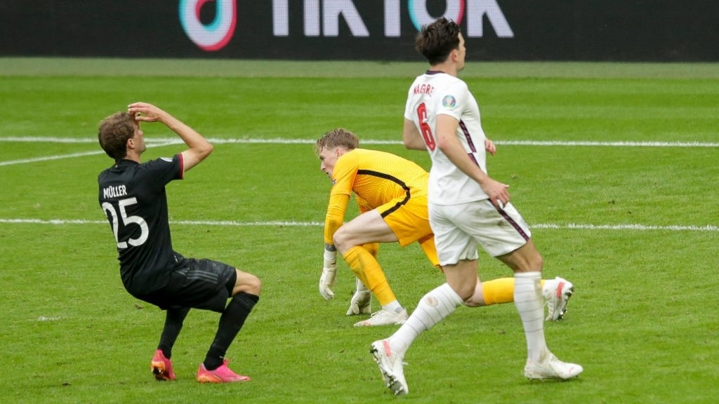 އިންގްލެންޑާއިި ޖަރުމަން ބައްދަލުކުރި މެޗުގެ ތެރެއިން - ފޮޓޯ: ގެޓީ އިމޭޖަސް