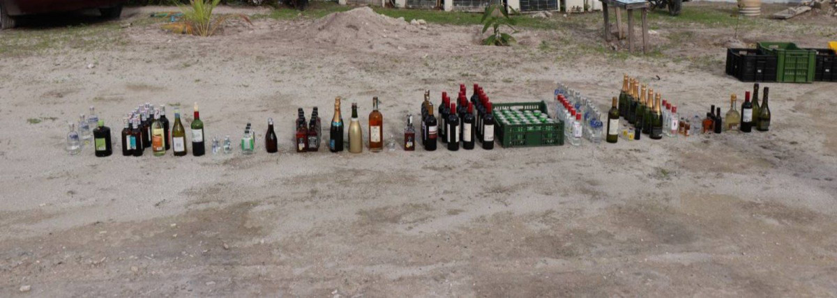 The bottles of alcohol destroyed by the police