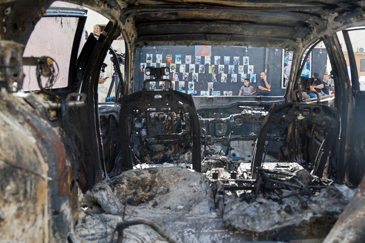 ހަމަލާގައި ހަލާކުވެފައިވާ ވެހިކަލެއް - ފޮޓޯ: ރޮއިޓަރސް