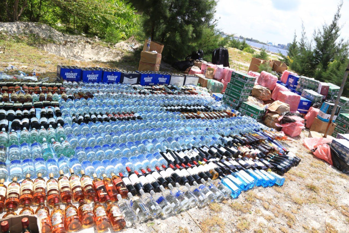 The bottles of alcohol in police custody, that were destroyed