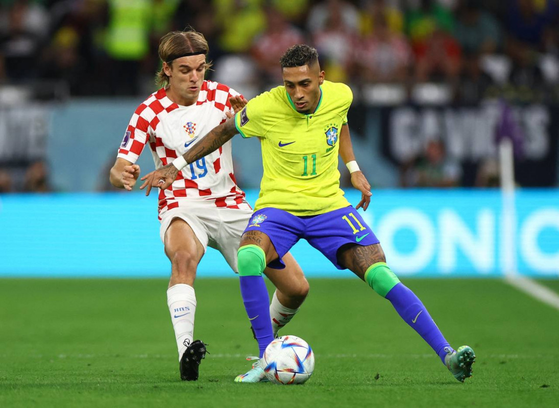 ބްރެޒިލް އަދި ކްރޮއޭޝިއާ ކުޅުނު މެޗުގެ ތެރެއިން - ފޮޓޯ: ރޮއިޓާސް