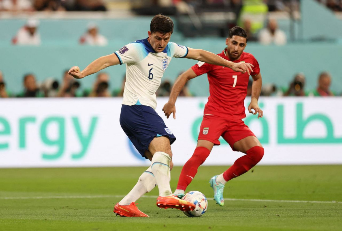 އިންގްލެންޑު އަދި އީރާން ކުޅުނު މެޗުގެ ތެރެއިން: ފޮޓޯ - ރޮއިޓާސް  