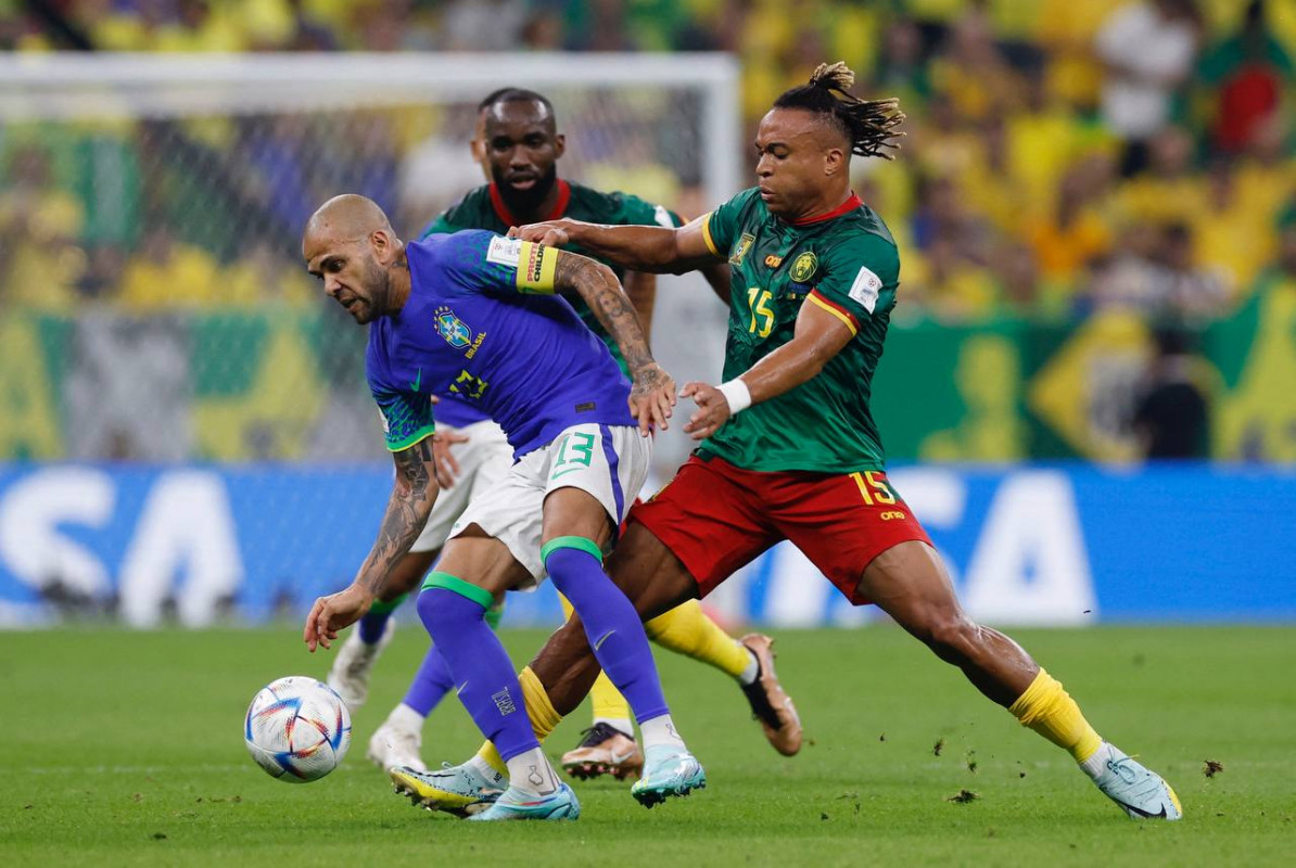 ކެމަރޫން އަދި ބްރެޒިލް ކުޅުނު މެޗުގެ ތެރެއިން - ފޮޓޯ: ރޮއިޓާސް