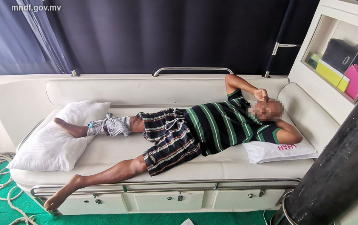 Fisherman attacked by shark after falling overboard