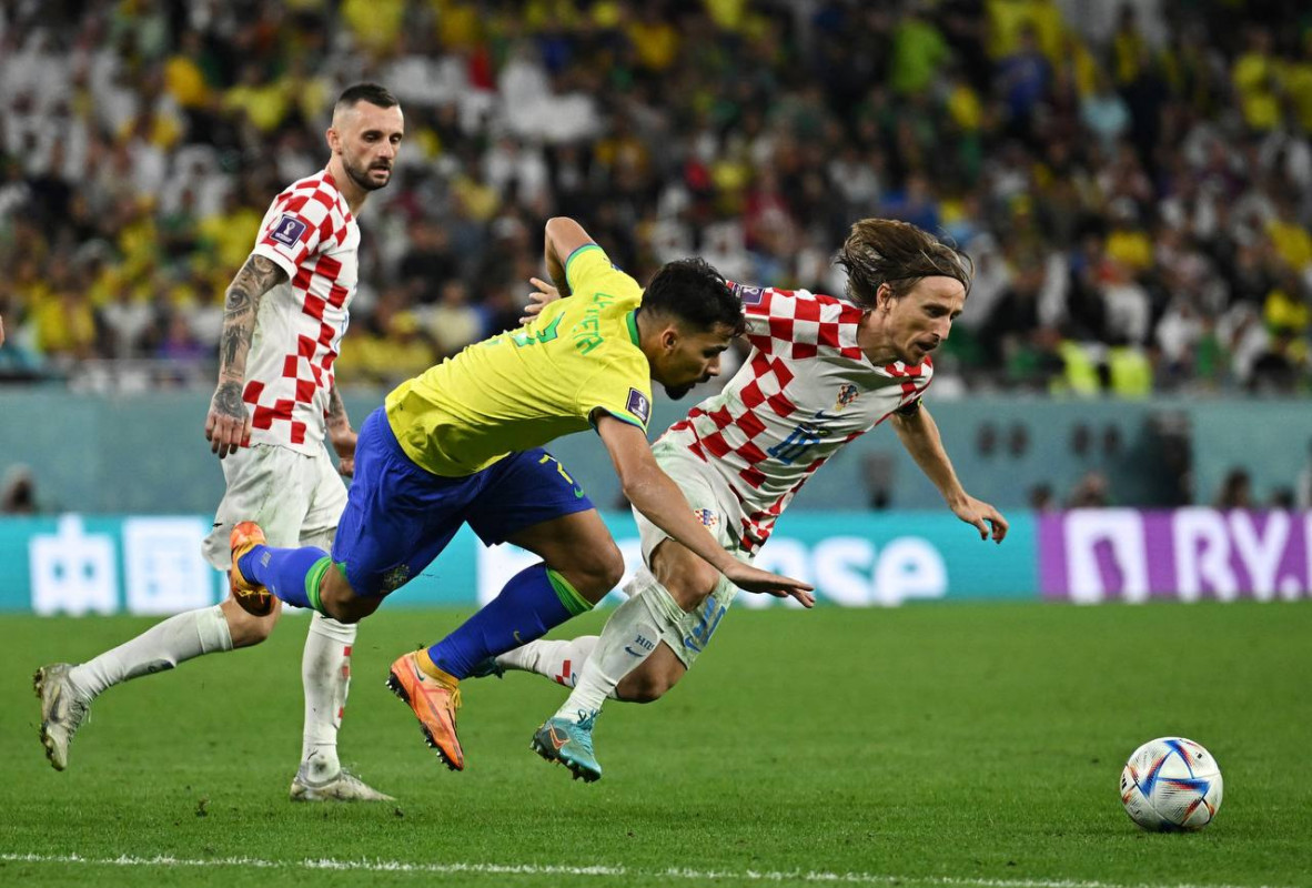 ބްރެޒިލް އަދި ކްރޮއޭޝިއާ ކުޅުނު މެޗުގެ ތެރެއިން - ފޮޓޯ: ރޮއިޓާސް