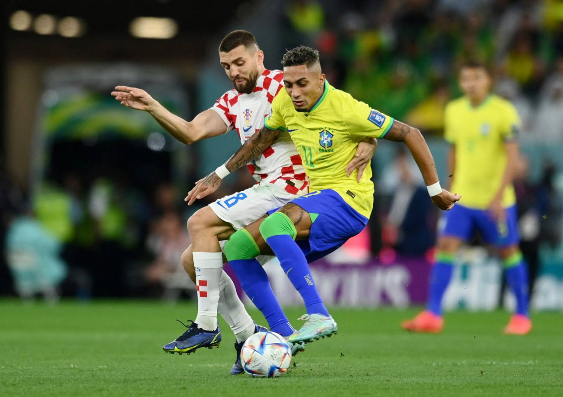 ބްރެޒިލް އަދި ކްރޮއޭޝިއާ ކުޅުނު މެޗުގެ ތެރެއިން - ފޮޓޯ: ރޮއިޓާސް