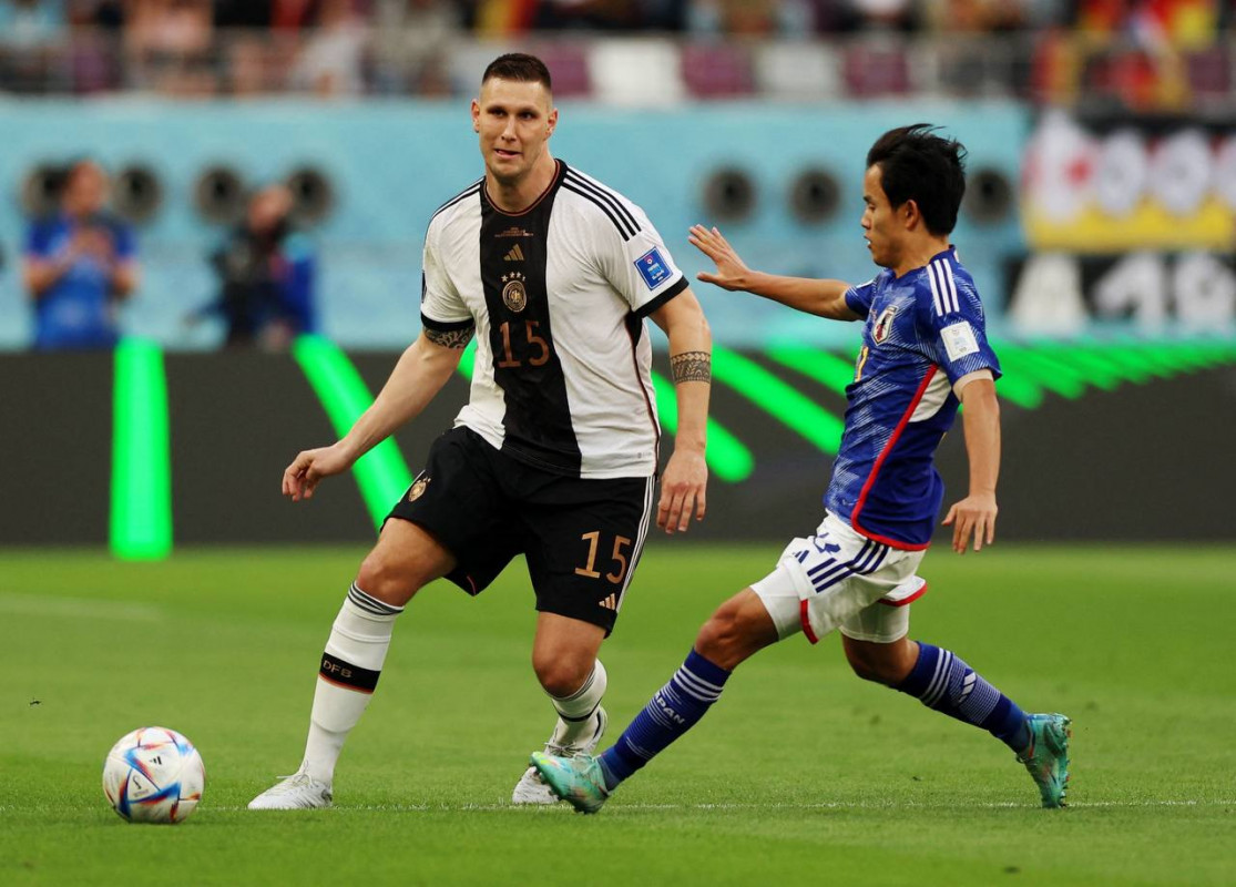 ޖަރުމަނު އަދި ޖަޕާން ކުޅުނު މެޗުގެ ތެރެއިން - ފޮޓޯ: ރޮއިޓާސް