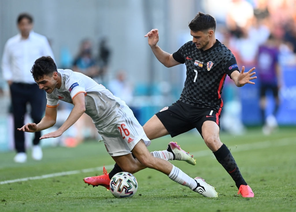 ކްރޮއޭޝިއާ އާއި ސްޕެއިން ބައްދަލުކުރި މެޗުގެ ތެރެއިން - ފޮޓޯ: ގެޓީ އިމޭޖަސް