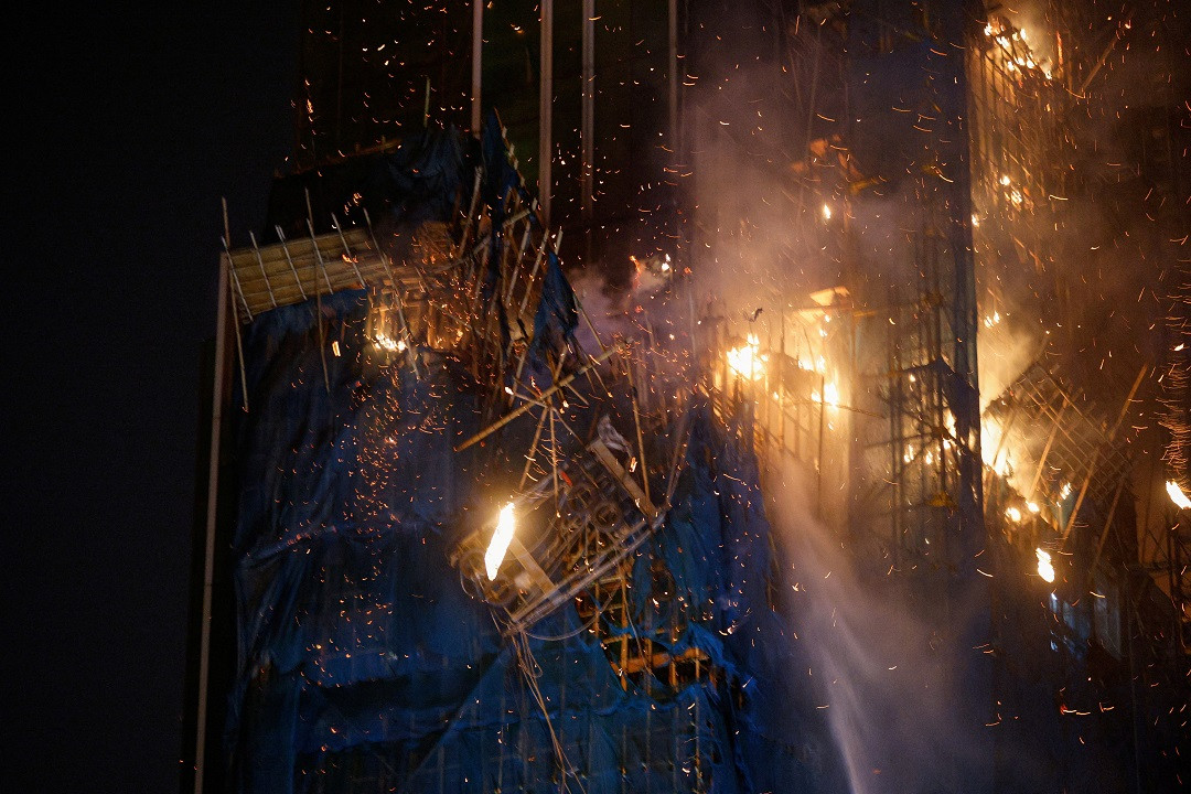 ހޮންގކޮންގ ގައި އިމާރާތްކުރަމުންދިޔަ އުސް އިމާރާތެއްގައި ރޯވެ އެނދުން - ފޮޓޯ: ރޮއިޓަރސް