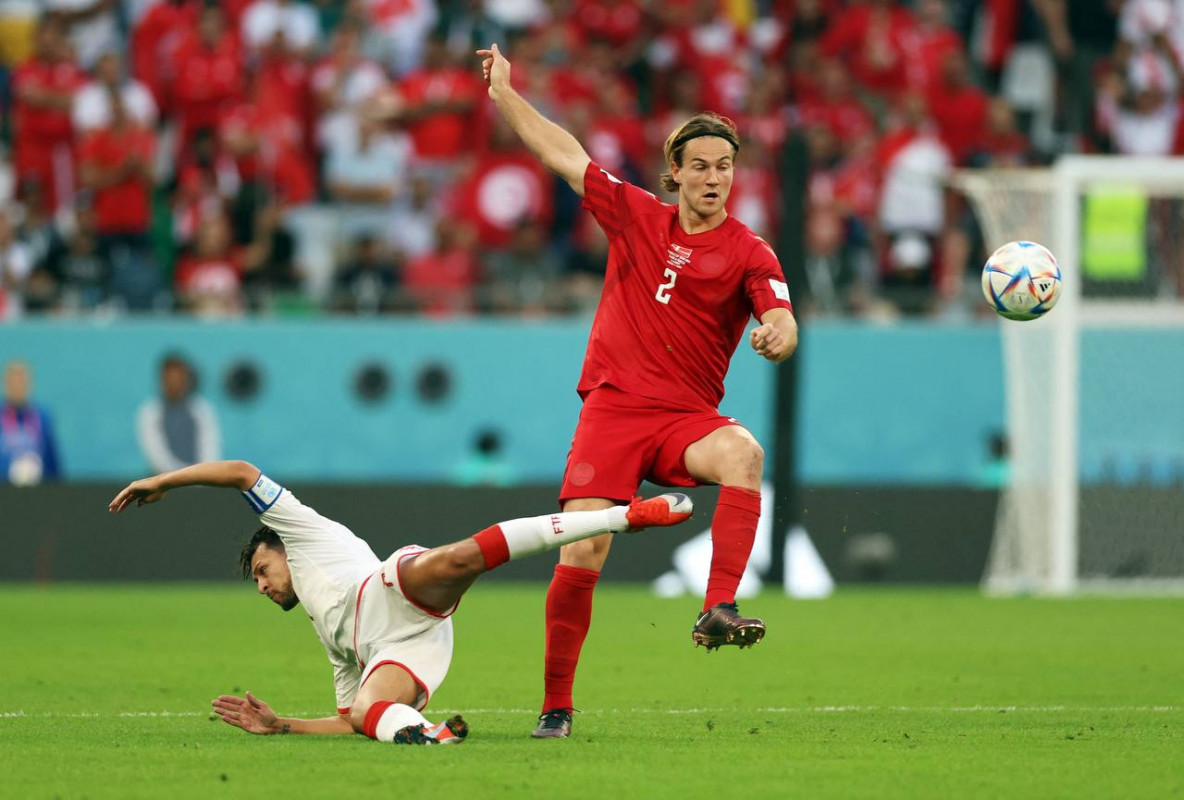 ޑެންމާކު އަދި ޓިއުނީޝިޔާ ކުޅުނު މެޗުގެ ތެރެއިން: ފޮޓޯ - ރޮއިޓާސް  