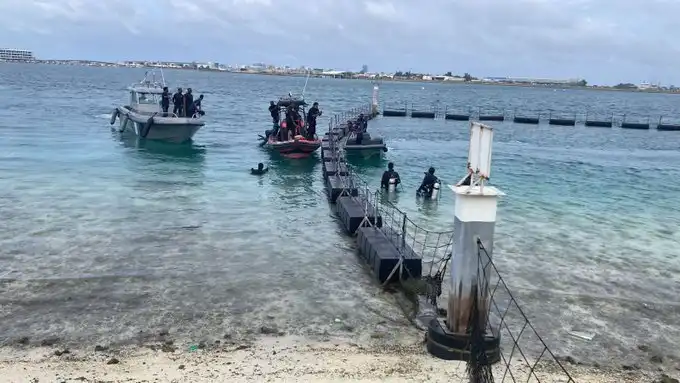 Authorities are searching for a crew member who went overboard from a fuel barge anchored in the lagoon north of the Hulhulé seaplane terminal.