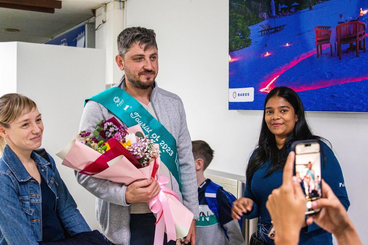 Tourist being welcomed at VIA