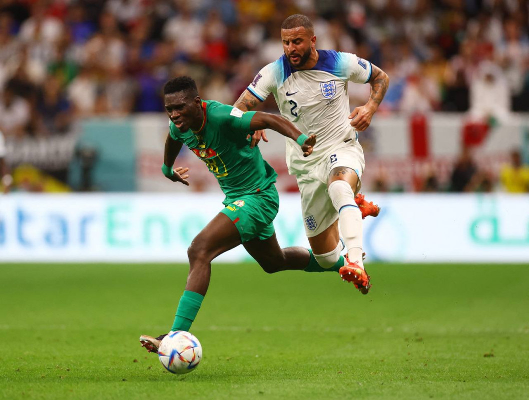 އިންގްލެންޑް އަދި ސެނެގާލް ކުޅުނު މެޗުގެ ތެރެއިން - ފޮޓޯ: ރޮއިޓާސް