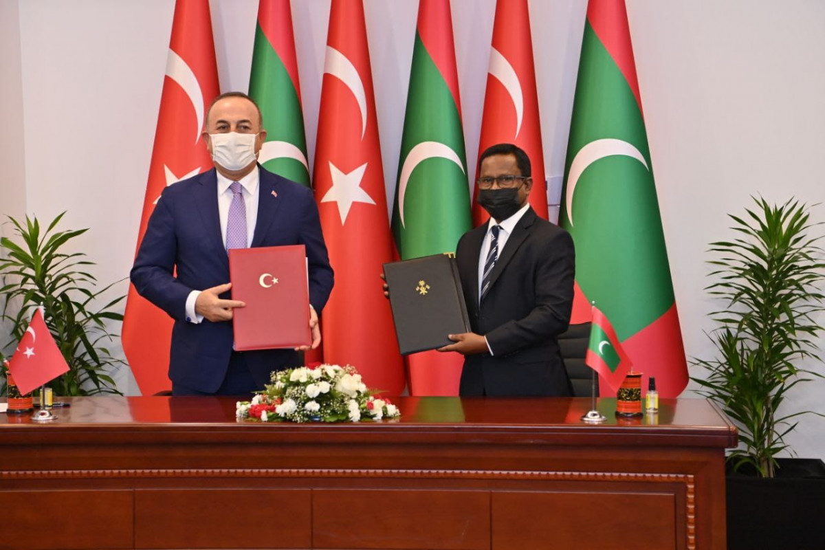 Minister of State Mohamed Thoriq signed on behalf of the Maldivian government