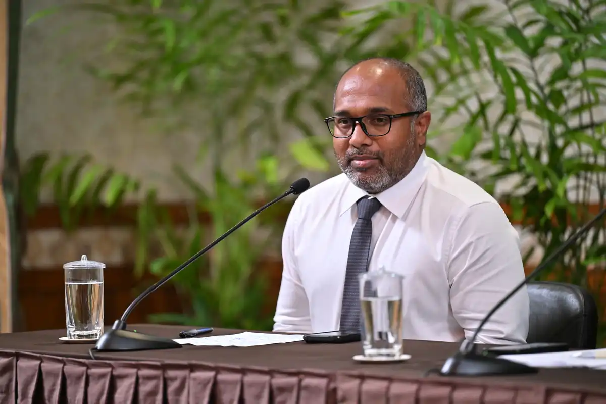 Home Minister Ali Ihusaan speaking to press.