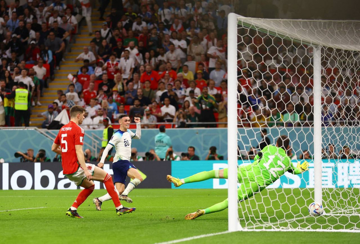 ވޭލްސް އަދި އިންގްލެންޑް ކުޅުނު މެޗުގެ ތެރެއިން - ފޮޓޯ: ރޮއިޓާސް