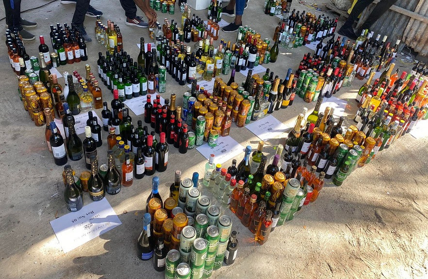 Destroyed were bottles of alcohol in custody of Dharavandhoo police station
